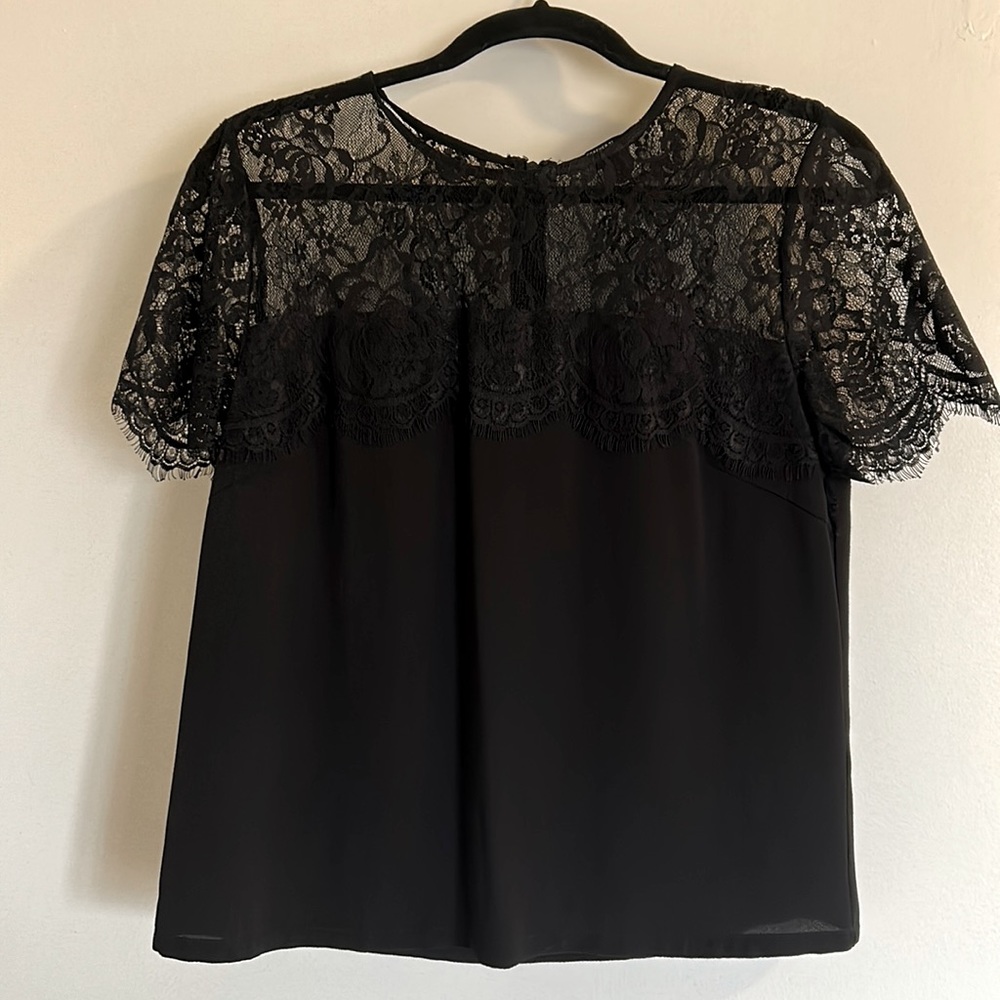 Black lace ryon top. The lace details and fabric are amazing!